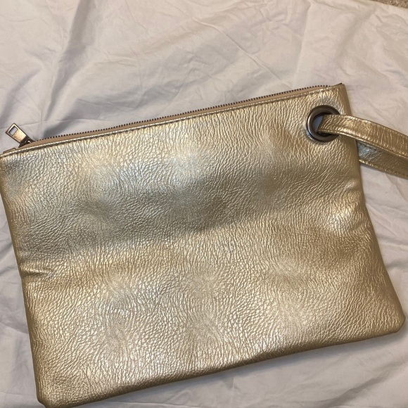 Oversized gold colour wristlet. Perfect for the holiday season. Used once. - Picture 1 of 3